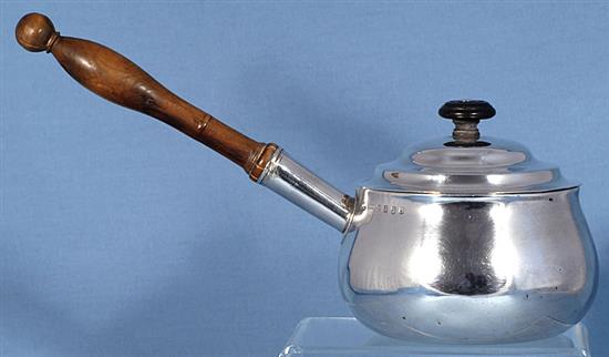 A George III Irish silver brandy pan and cover, by James Le Bass, length 310mm, gross weight 18.8oz/585grms.